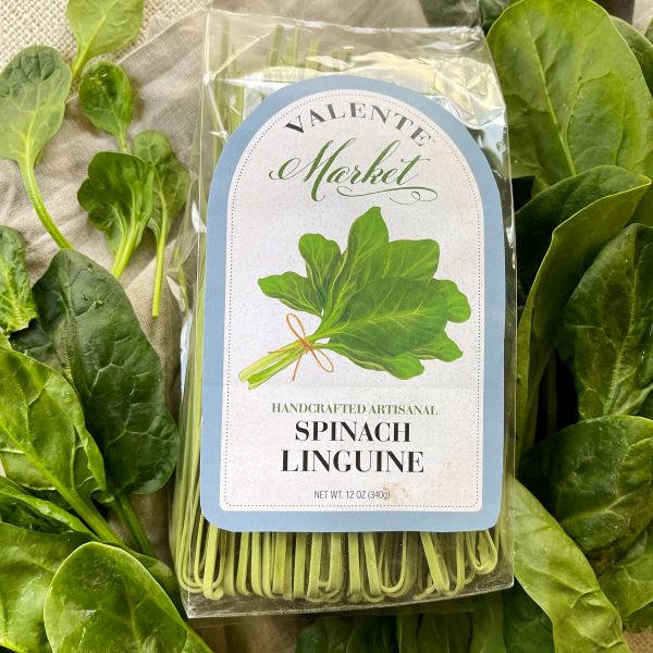 Spinach linguine with blue border on the label in a clear bag