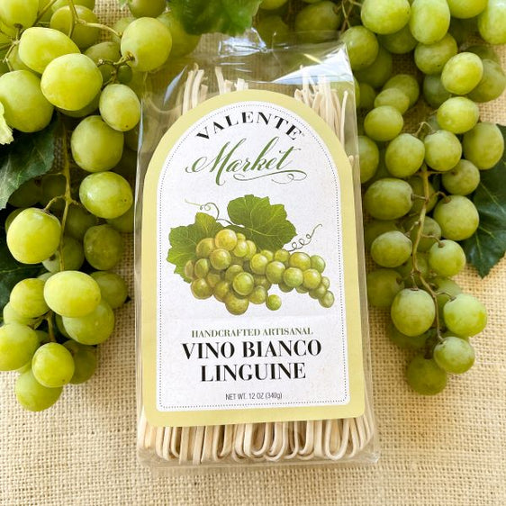 Featuring White grapes and White wine pasta with a bright lime green/yellow  border on the label in a clear bag